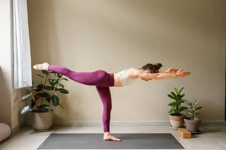 Achieving the Perfect Tone: How Often Should You Exercise for Results? 1 Woman doing Yoga exercise Falkirk to help with toning the body.