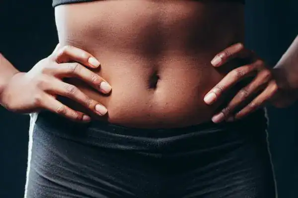 Toning Your Stomach: The Ultimate Guide to Achieving a Sculpted Stomach While Shedding Pounds 1 Image of a toned stomach after non surgical treatment Falkirk
